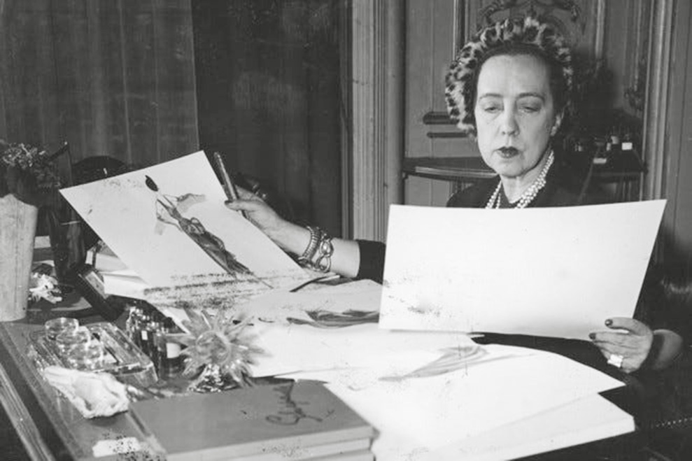 Schiaparelli reviewing designs, 1949